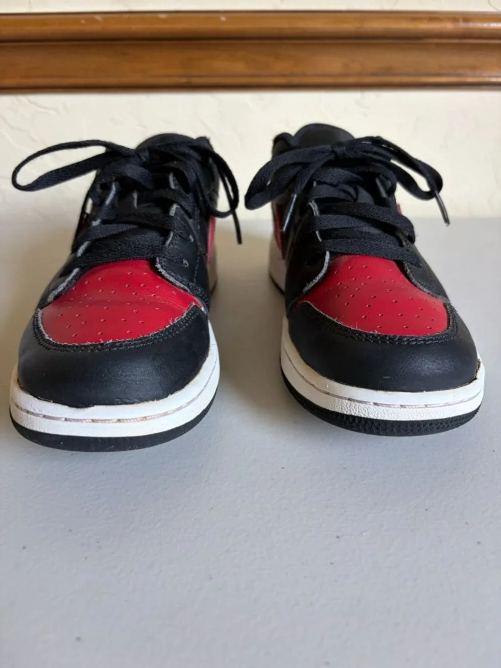 Nike Air Jordan 1 Low Grade Banned Black Varsity Red Iconic Wings Logo 553560-06